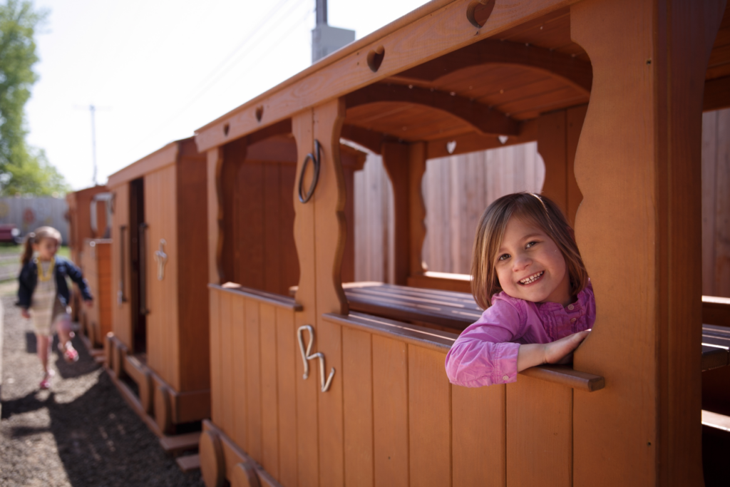 Child on a kids train